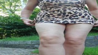 Furry outdoor squirt fest exposed: hairy thighs soaked beneath midnight sun's warm gaze.