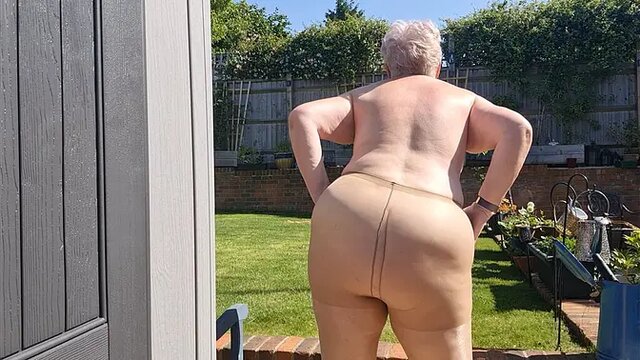 British mature mom with big tits dances naked in her garden