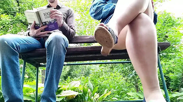  Busty woman in stockings urinates nearby &mdash;  seen from below