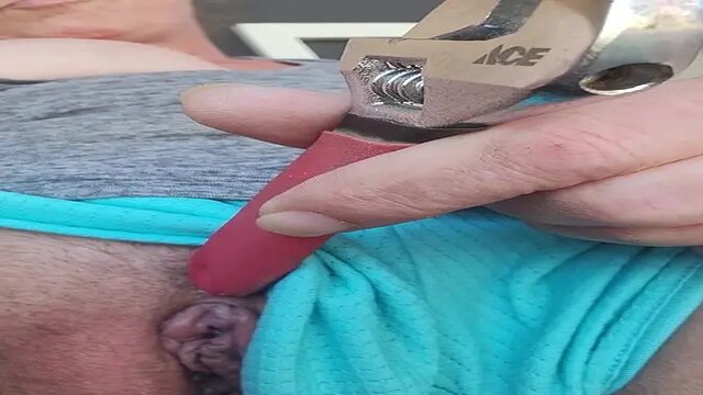 Naughty American redhead smokes and exposes her pussy