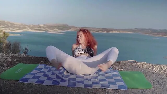 Redhead yoga instructor worships feet in soaking spandex leggings