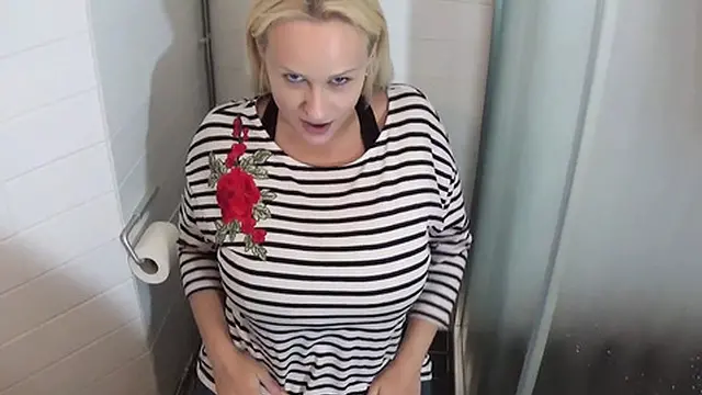 Hot milf gets fucked in a public restroom
