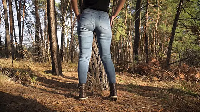  Busty Woman Teases In TightJeans By The Woodside