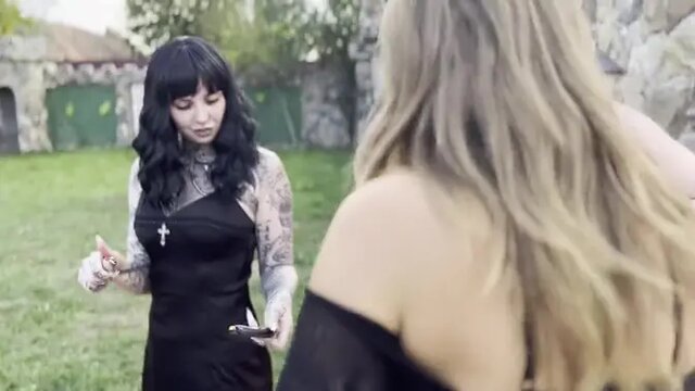 Tattooed Canadian and Hungarian Mistress waxing slave's bare ass