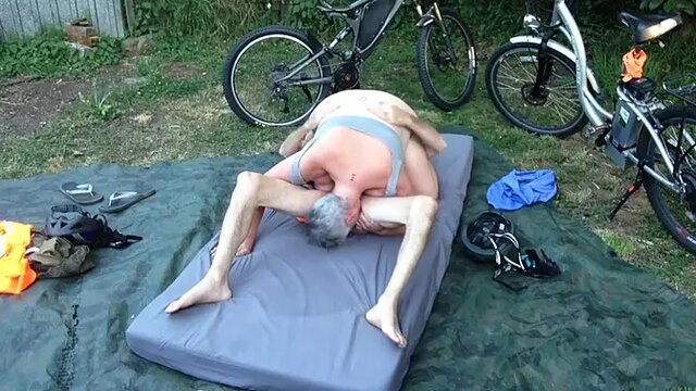Mature mom and wife in 69 position outdoors