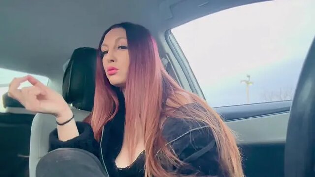 Big-Titted Italian MILF shows off nipple while smoking in the car