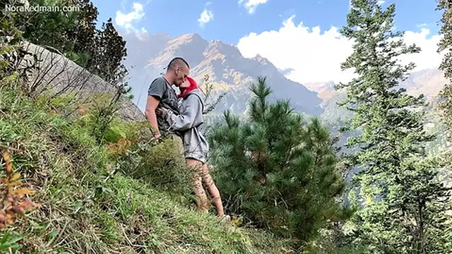 Petite redhead enjoys blowjob and doggy style during mountain trek