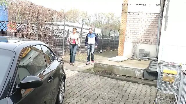 Red-haired German MILF gets nailed in the car