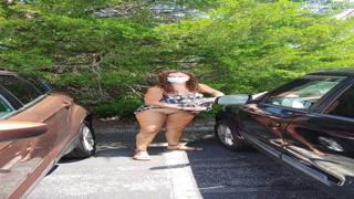 Blonde babe swaps out her shoes in the parking lot, gets caught in the act