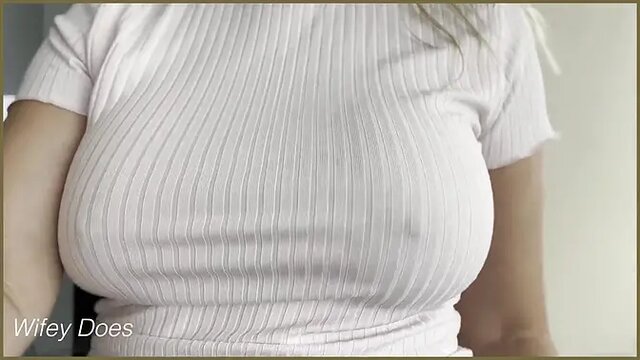 Busty MILF teases with bouncing boobs in public