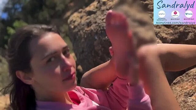 Hot Latina teen licks her feet while making sexy eye contact