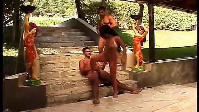 Tattooed slut moans as she's double penetrated by two horny guys