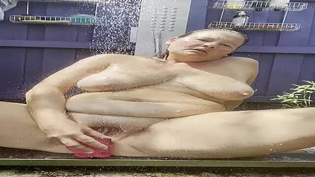 Girl rides toy and plays with her big natural tits, cumming on herself