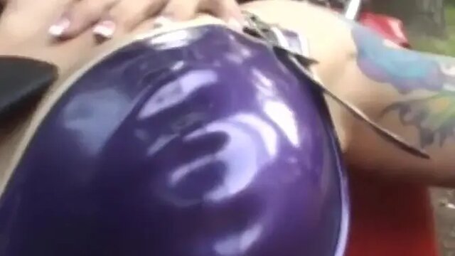 Dyke domme in latex suit and gas mask spanks submissive pussy play partner