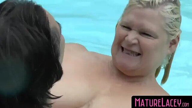 UK GILF Lacey shows off big tits with two young babes