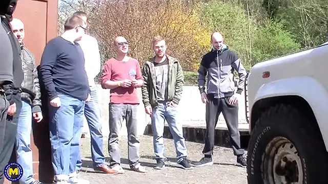 German milf enjoys a wild group session