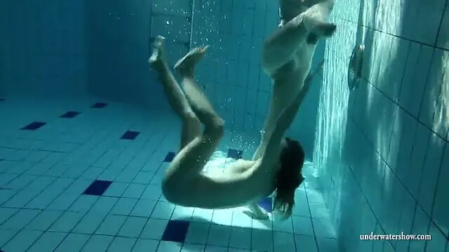 Underwater lesbian kiss turns into passionate nude fucking