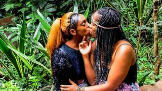 African festival outdoor lesbian make-out