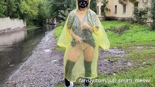 Teen in yellow raincoat flashes pussy outdoors in the rain