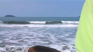 Two sluts share a big cock by the sea
