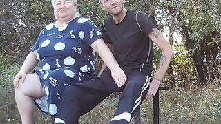 a friend in a public park jerks off my dick on a bench