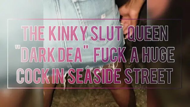 Dark Dea, the kinky slut queen, pisses and fucks a huge shaft in the seaside street