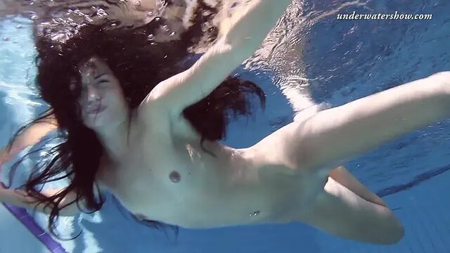 Russian nymphomaniac shows off her tight 18-year-old pussy and tits underwater