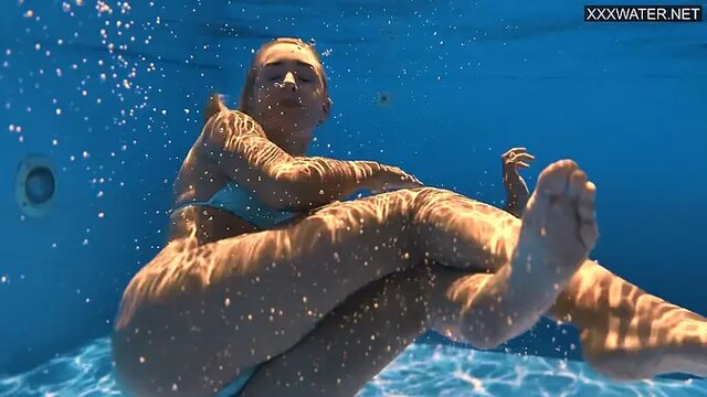 Hungarian blonde bombshell Sofi Otis flaunts big tits in swimsuit