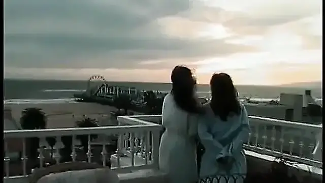 Lesbian lovers squirt and play on the porch