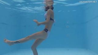Tiny slender Hermione Ganger in a steamy underwater scene