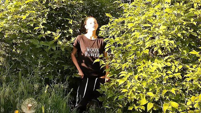 Curvy girl jacks off in nature, enjoys caught by a guy